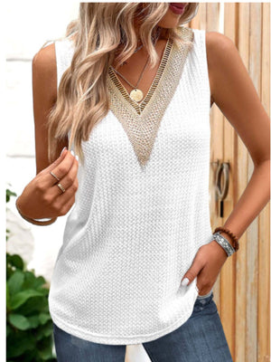 White textured knit sleeveless blouse with metallic V-neck trim