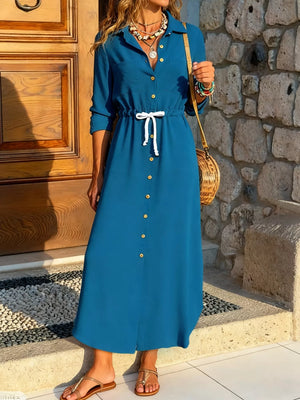 French blue button-down maxi dress with drawstring waist and gold buttons.