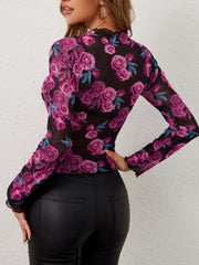 Floral mesh second-skin top with long sleeves and lettuce trim detail.