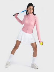 Carnation pink ribbed performance zip-up track jacket with thumbholes.