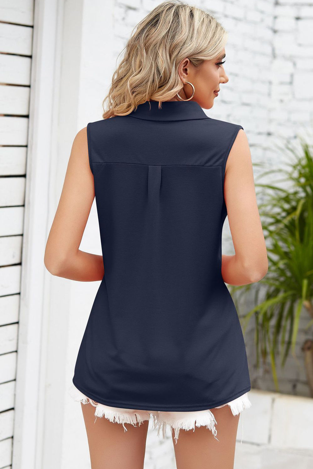 Dark Blue sleeveless collared top with pleat front detail