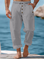 Gray relaxed fit drawstring sweatpants with button fly and cuffed hem