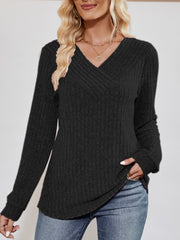 Black textured ribbed V-neck pullover sweater with long sleeves.
