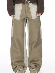 Distinctive two-tone cargo sweatpants with contrast stitching and wide leg fit.