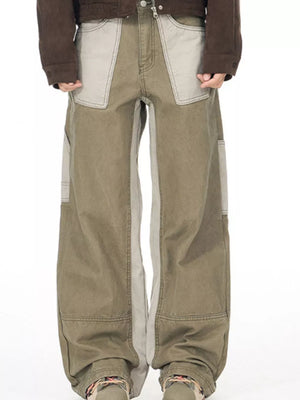 Distinctive two-tone cargo sweatpants with contrast stitching and wide leg fit.