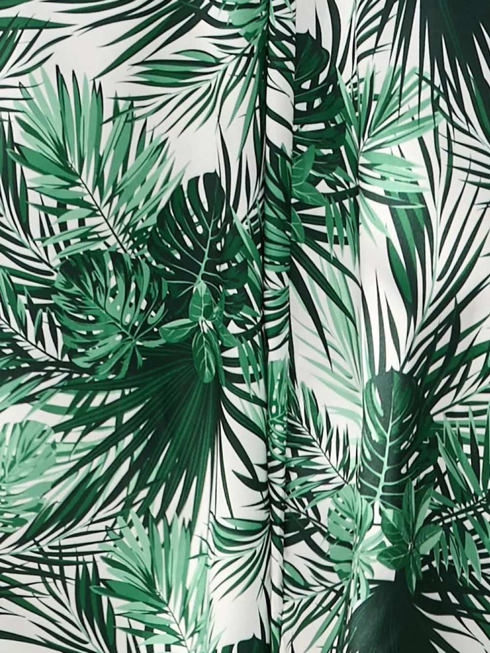 Chic floral midi dress fabric with green palm leaf print.