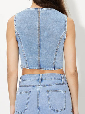 Light wash denim bustier vest with seam details and a cropped hem.