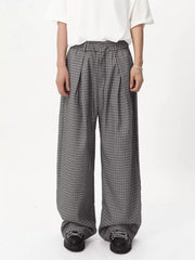 Plaid wide-leg relaxed fit pants in grey with adjustable drawstring waist.