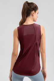 Burgundy mesh panel performance tank top with back pleats.
