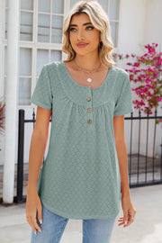 Sage eyelet yoke gathered henley shirt with short sleeves and button detail.