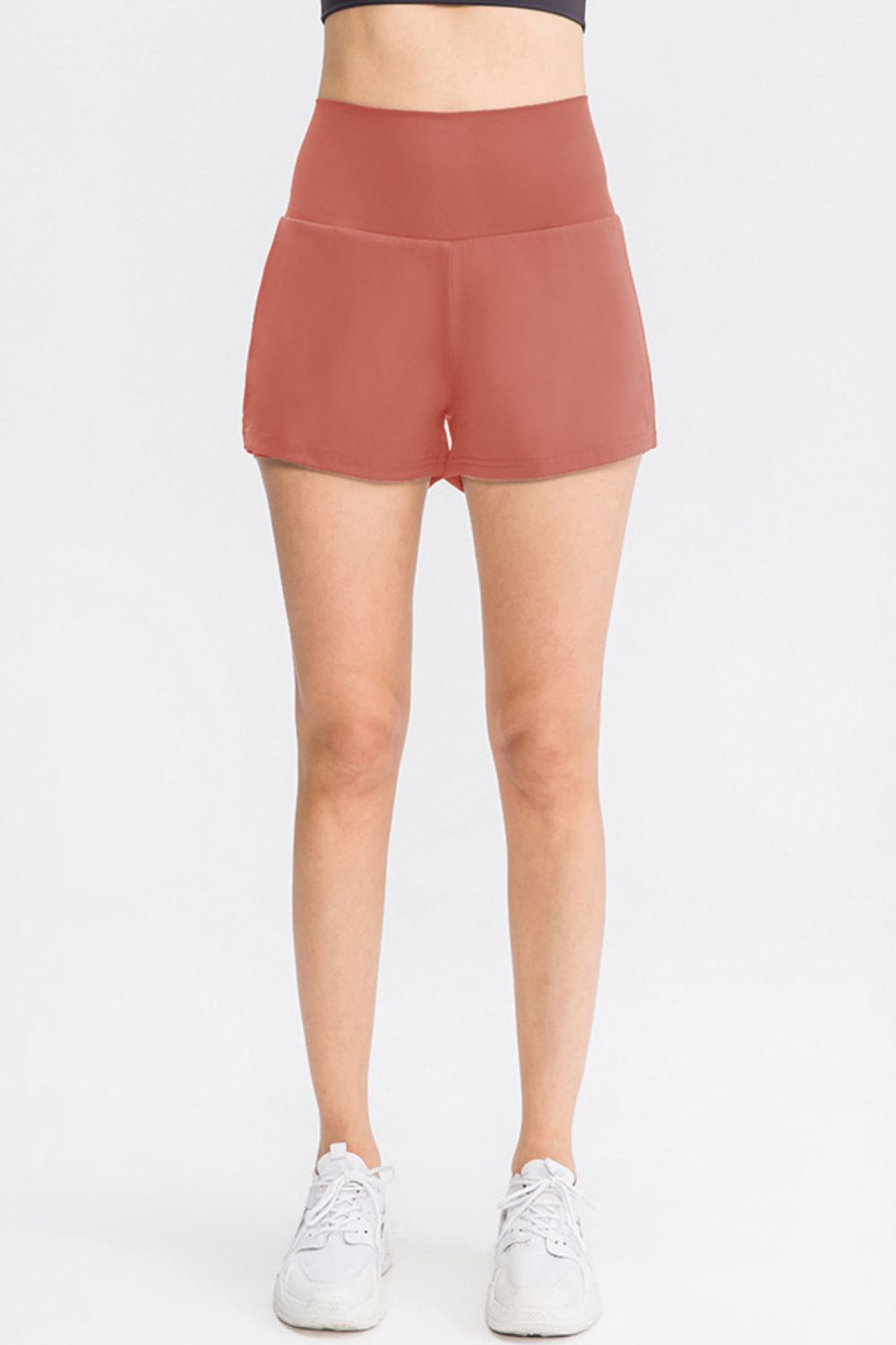 Sculpted high-waist active shorts in Dusty Pink with a V-shaped waistband.