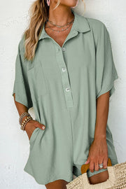 Sage oversized shirt romper with pockets and button front