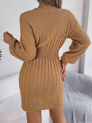 Tan cable knit mini dress with ribbed waist and long sleeves