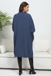 Dark Blue oversized pocketed knit cardigan with long sleeves and a collared neckline.