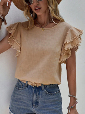 Khaki blouse with pom-pom trimmed ruffle sleeves and round neckline.
