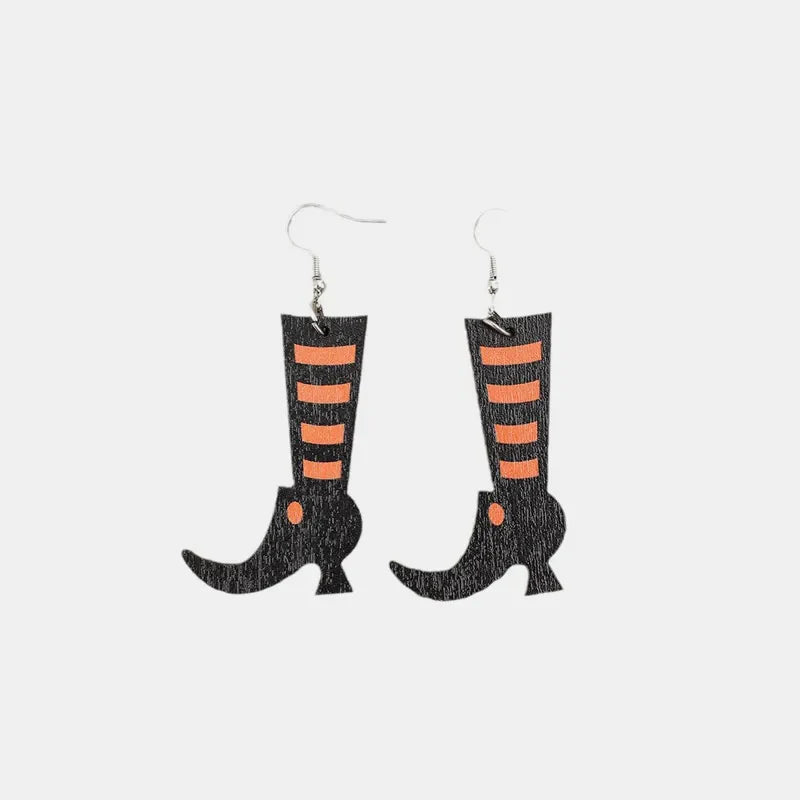 Black witch boot silhouette drop earrings with orange stripes and a pointed toe.