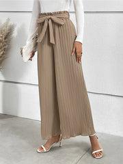 Camel pleated palazzo trousers with tie waist, wide leg, and a paperbag waist.