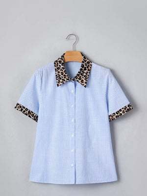 Blue striped button-down shirt with leopard print collar and cuffs