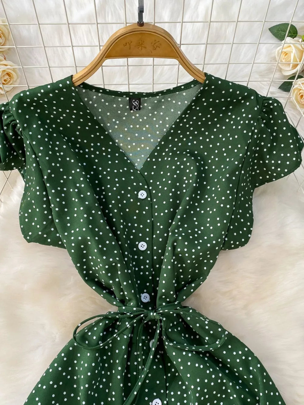 Green polka dot maxi dress with button front and tie belt