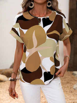 Women's abstract floral print t-shirt in brown, tan, black, and white with short sleeves.