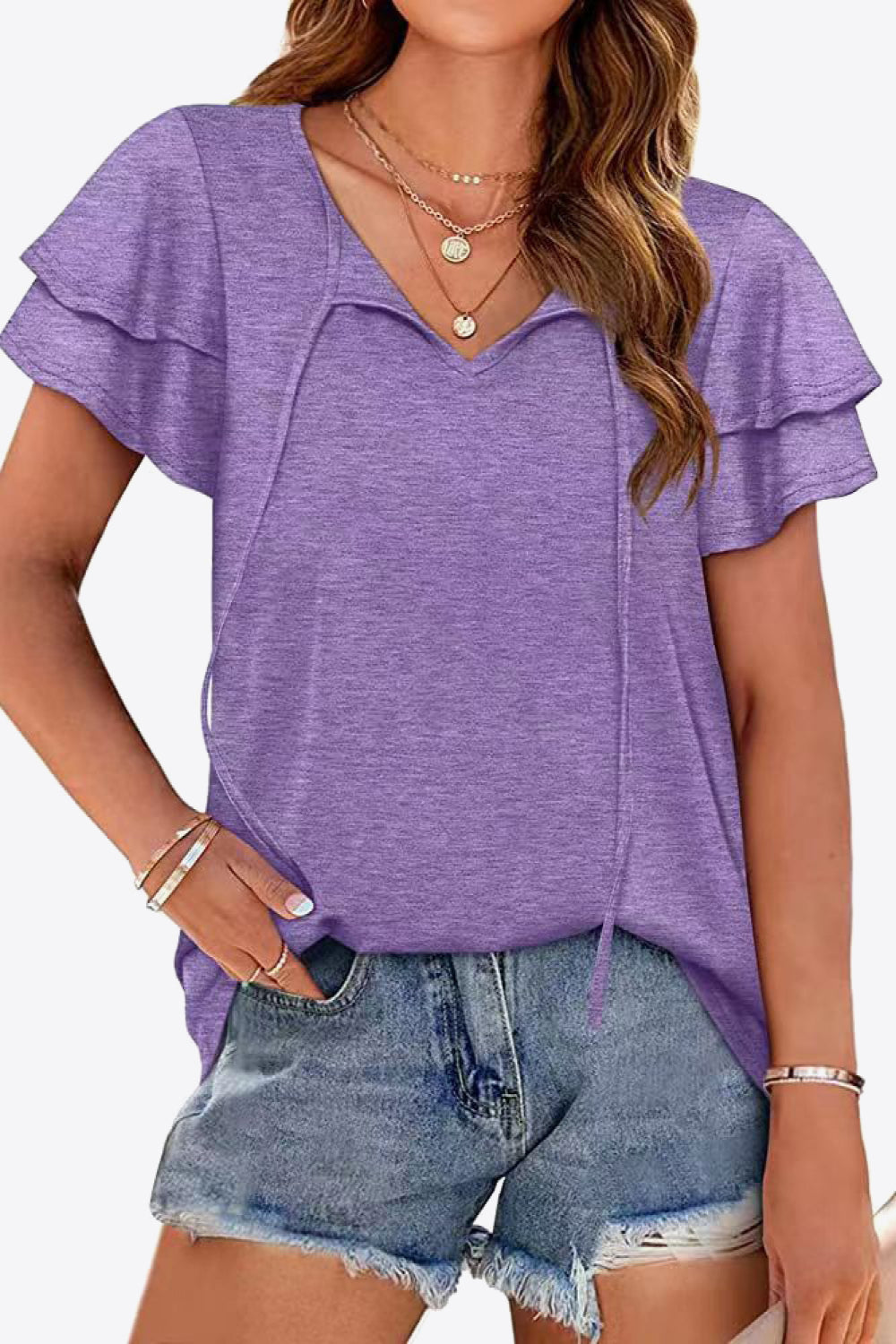 Purple tiered sleeve blouse with keyhole neckline and tie detail