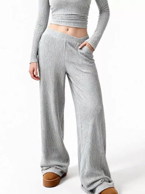 Comfy ribbed light gray wide-leg pants with pockets, part of a two-piece set.