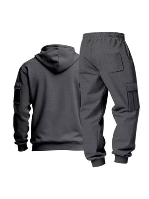 Dark gray men's cargo sweatpants and hoodie set with patch pockets.
