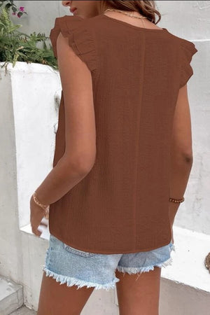 Brown flutter sleeve blouse with textured fabric and embroidered trim.