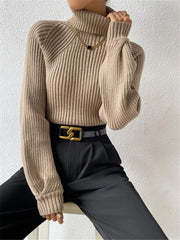 Mocha ribbed turtleneck knit sweater with puff sleeves and a high neck.