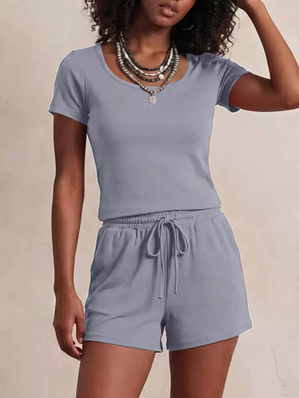 Blue scoop-neck tee and drawstring shorts set for women.