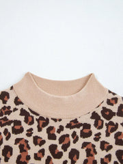 Leopard print ribbed high neck sweater dress with beige mock neck detail.