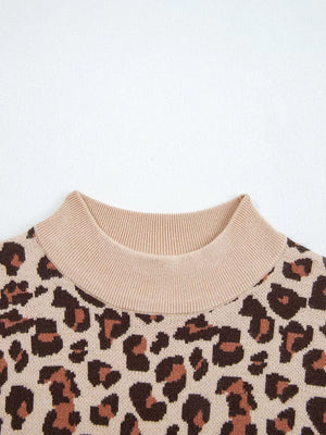 Leopard print ribbed high neck sweater dress with beige mock neck detail.