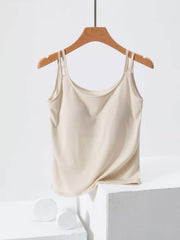 Smooth draped cami in Coconut Milk White with double spaghetti straps.