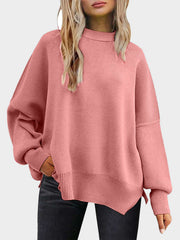 Dusty Pink oversized ribbed knit sweater with drop shoulders and mock neck.