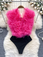 Pink ruffled V-neck bodysuit with lace detail and tie front