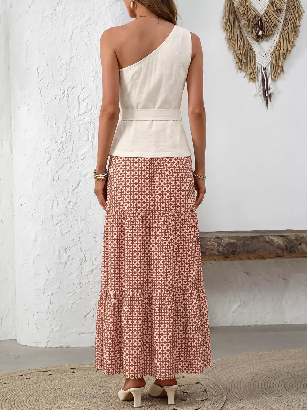 Cream one-shoulder top with belt and geometric print maxi skirt set