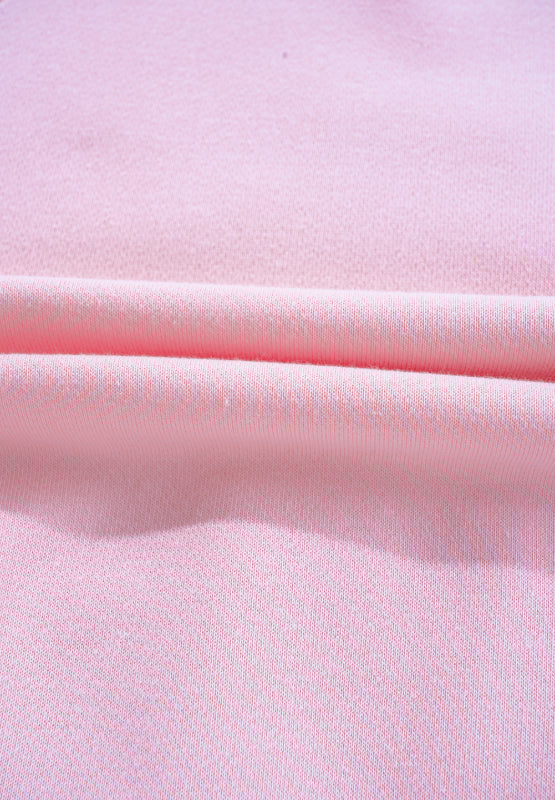 Blush pink off-shoulder sweatshirt with soft fabric texture