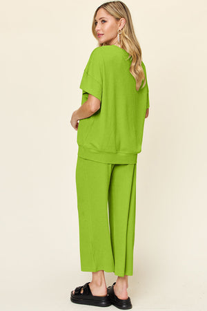 Lime waffle knit lounge set with short sleeve top and wide leg pants.
