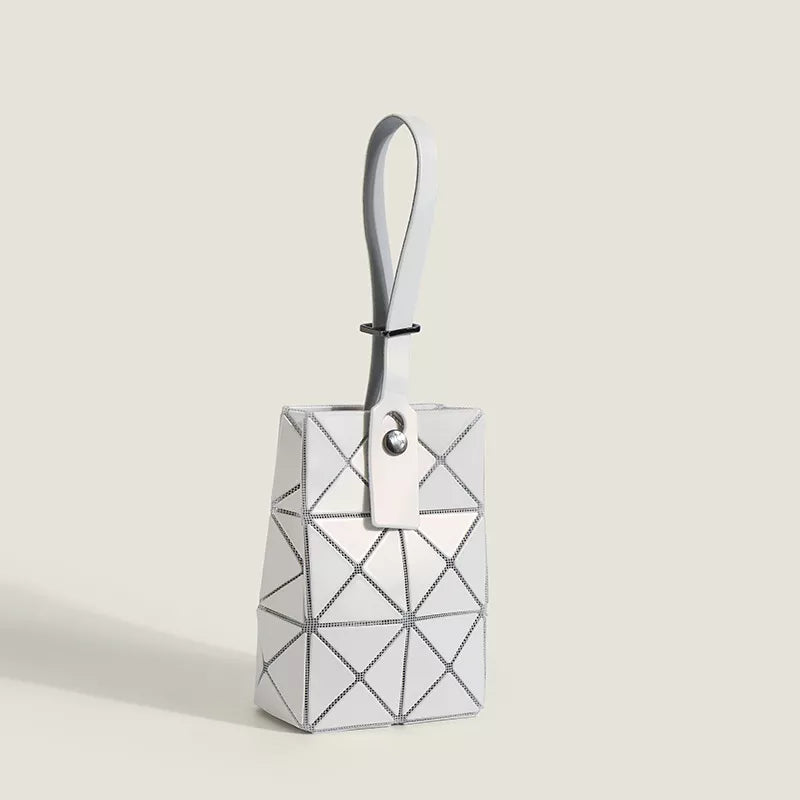 White geometric panel mini tote bag with a single strap.