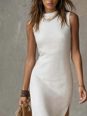 White sleeveless midi dress with side slit and mock neck
