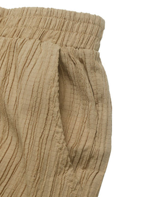 Tan textured drawstring waist relaxed fit trousers with pocket detail