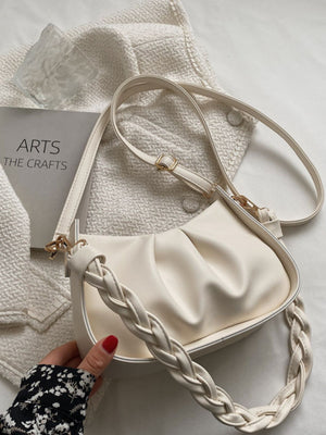 White ruched crossbody bag with braided strap and gold hardware