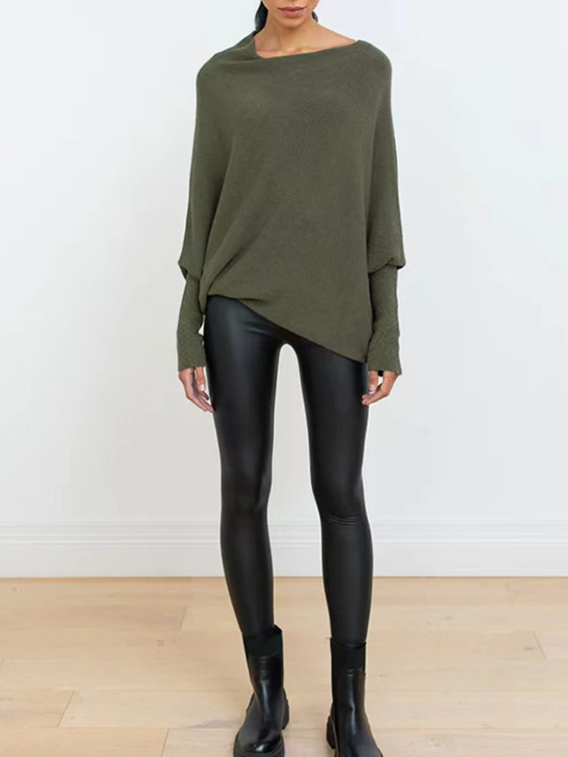 Army green off-shoulder knit sweater with textured cuffs and batwing sleeves.
