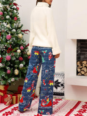 Festive print wide-leg lounge trousers in blue with Christmas motifs.
