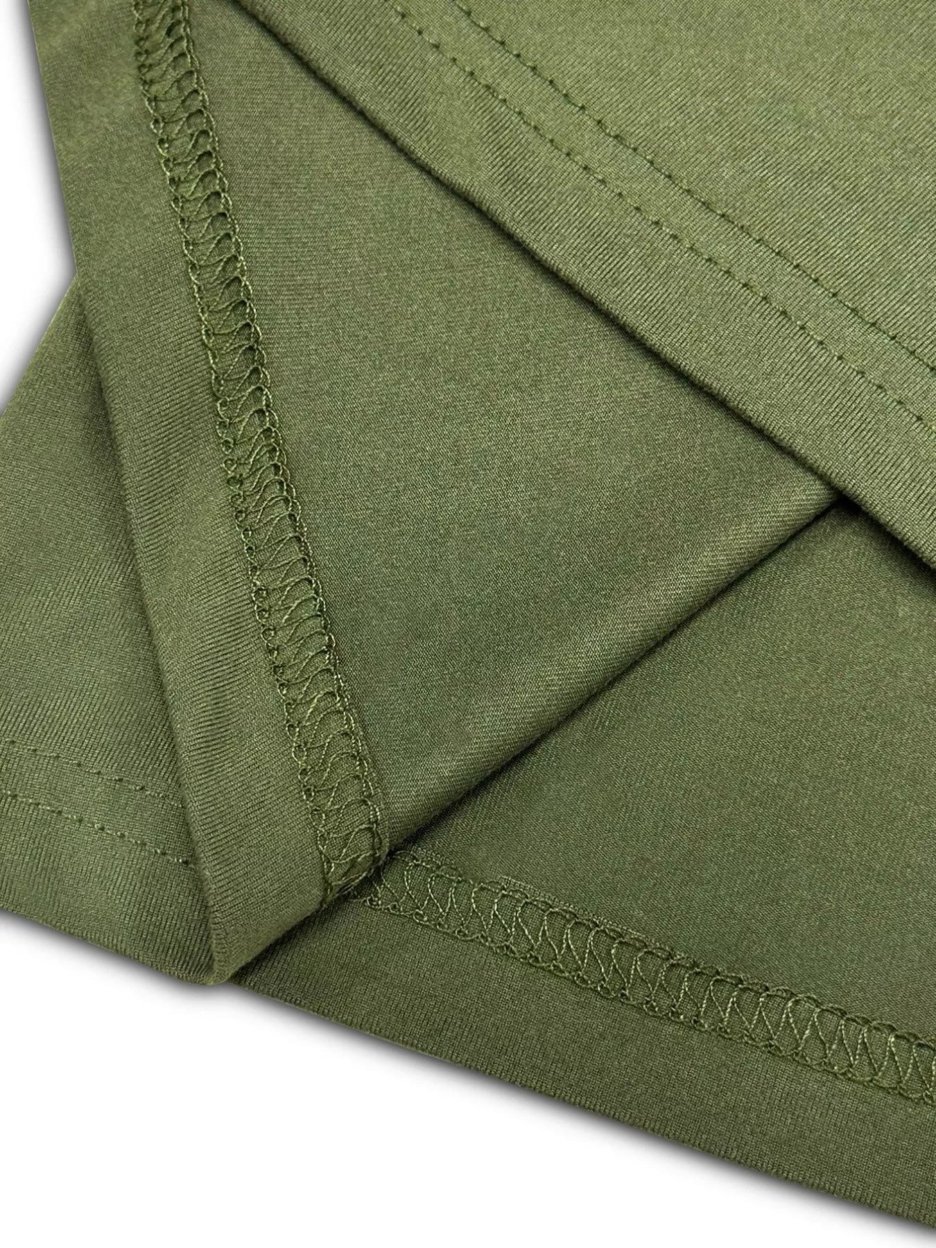 Moss green two-piece loungewear set detail showing fabric texture and stitching.