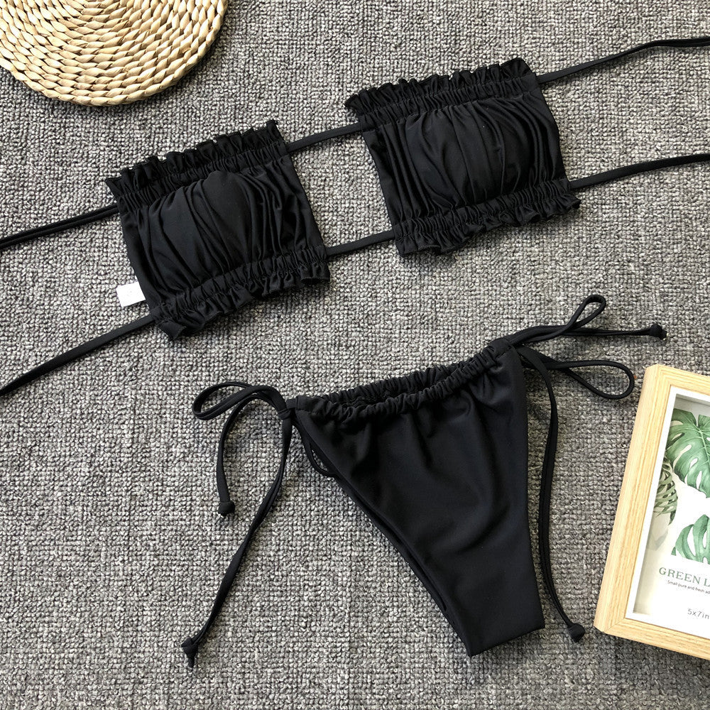 Black polka dot ruffle bandeau bikini set with tie-side bottoms