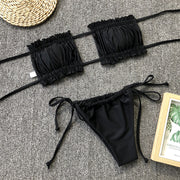 Black polka dot ruffle bandeau bikini set with tie-side bottoms