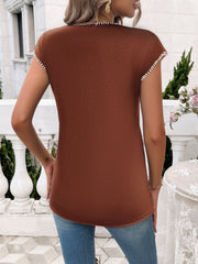 Textured stitch detail cap sleeve top in dark brown with white trim.