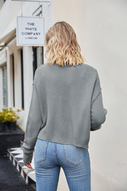 Textured knit cropped cardigan in Cloudy Blue with button details.
