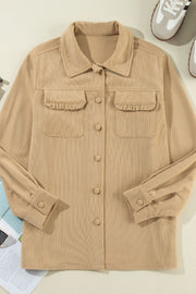 Tan corduroy utility shirt with ruffled chest pockets and button front.